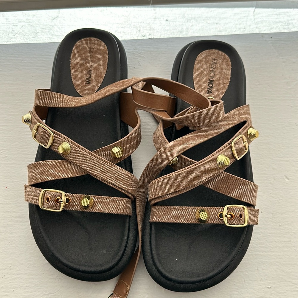 Brown and gold studded flat sandals